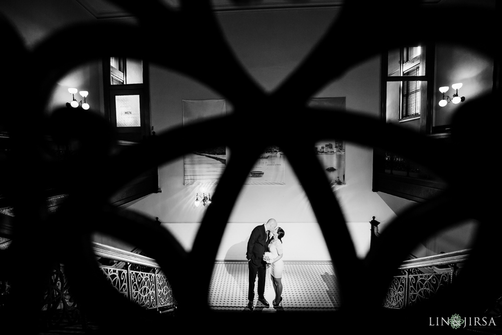 Bride and groom portrait on staircase inside Old Courthouse Museum Santa Ana