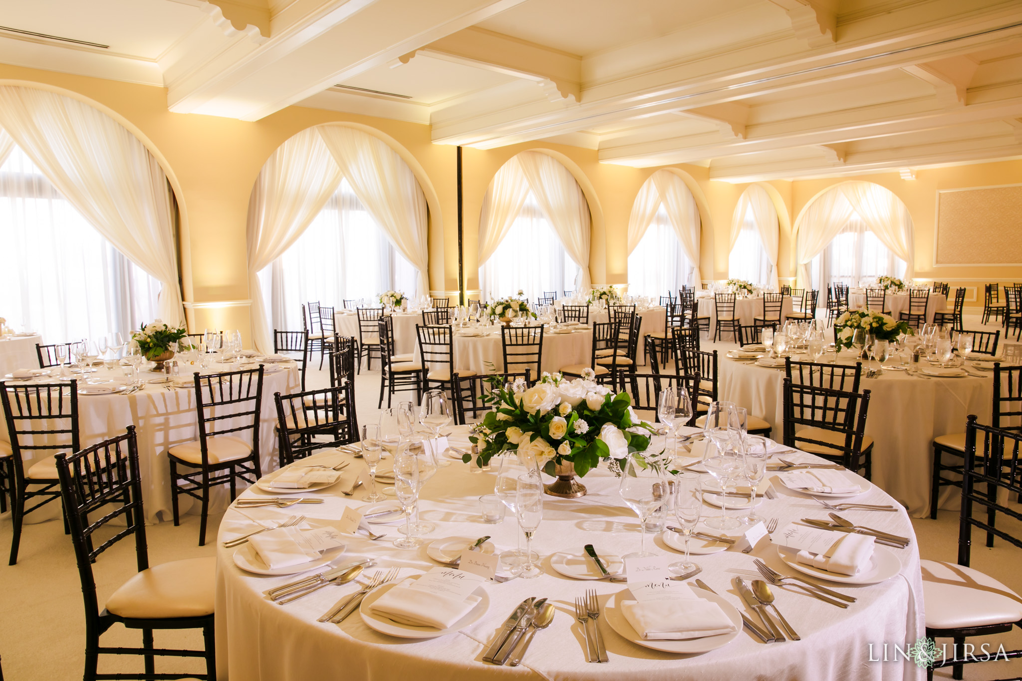 Reception in the Huntington Ballroom with ocean views at a Hyatt Regency Huntington Beach wedding by Lin and Jirsa