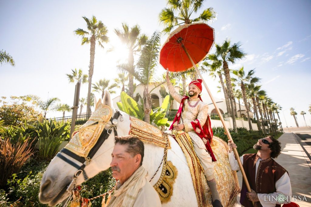 Baraat procession at a Hyatt Regency Huntington Beach Indian wedding photographed by Lin and Jirsa
