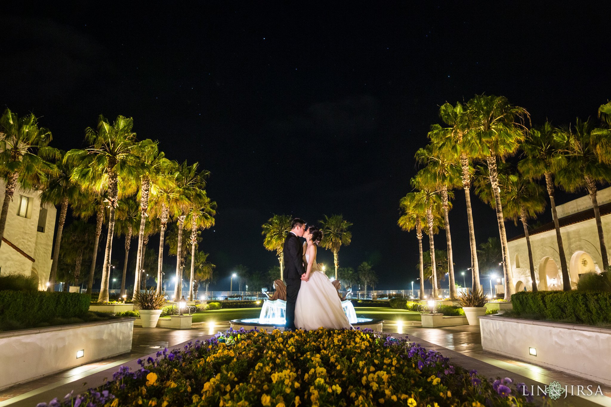 Nighttime couple's portrait at a Hyatt Regency Huntington Beach wedding by Lin and Jirsa