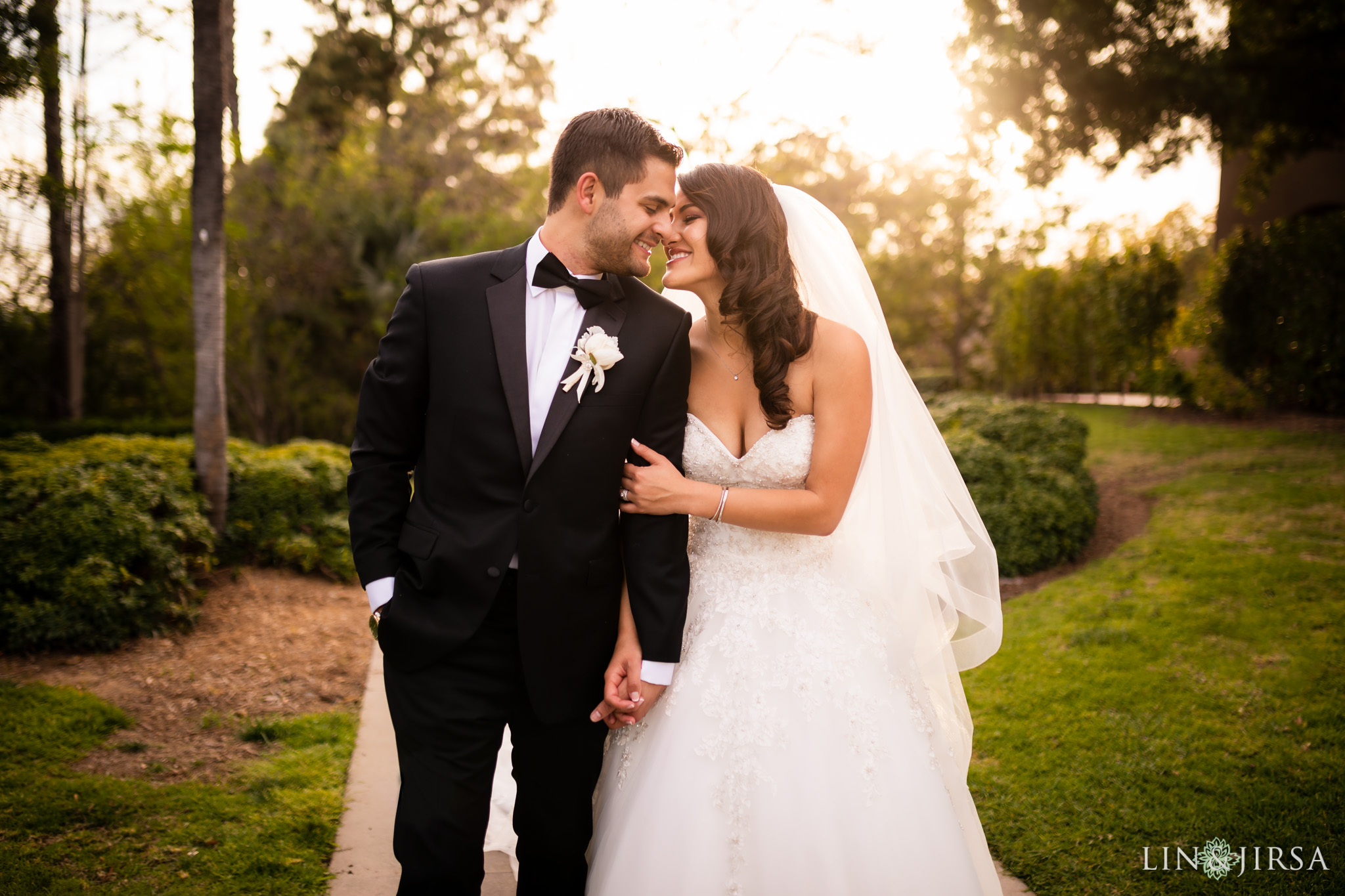 Wedding portrait along the garden pathways at Langham Huntington Pasadena photographed by Lin and Jirsa