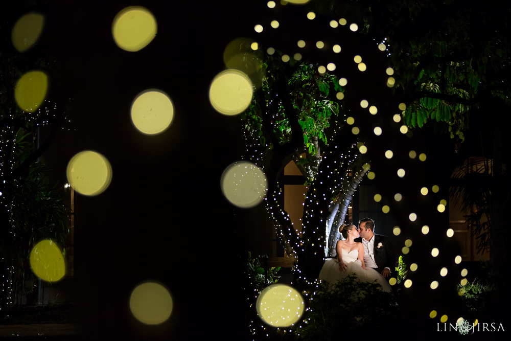 Nighttime couple portrait in the center courtyard at Langham Huntington Pasadena wedding by Lin and Jirsa