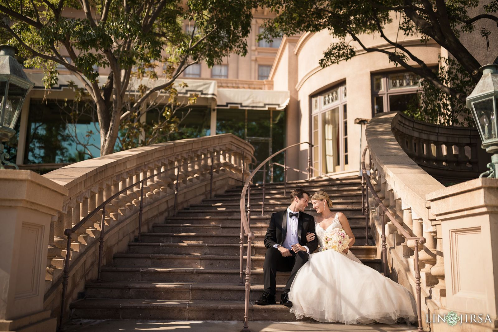 Bride portrait on the grand staircase at Langham Huntington Pasadena wedding photography by Lin and Jirsa