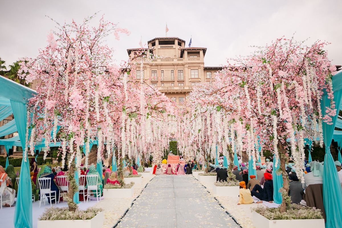 Wedding ceremony in the Horseshoe Garden at Langham Huntington Pasadena photographed by Lin and Jirsa