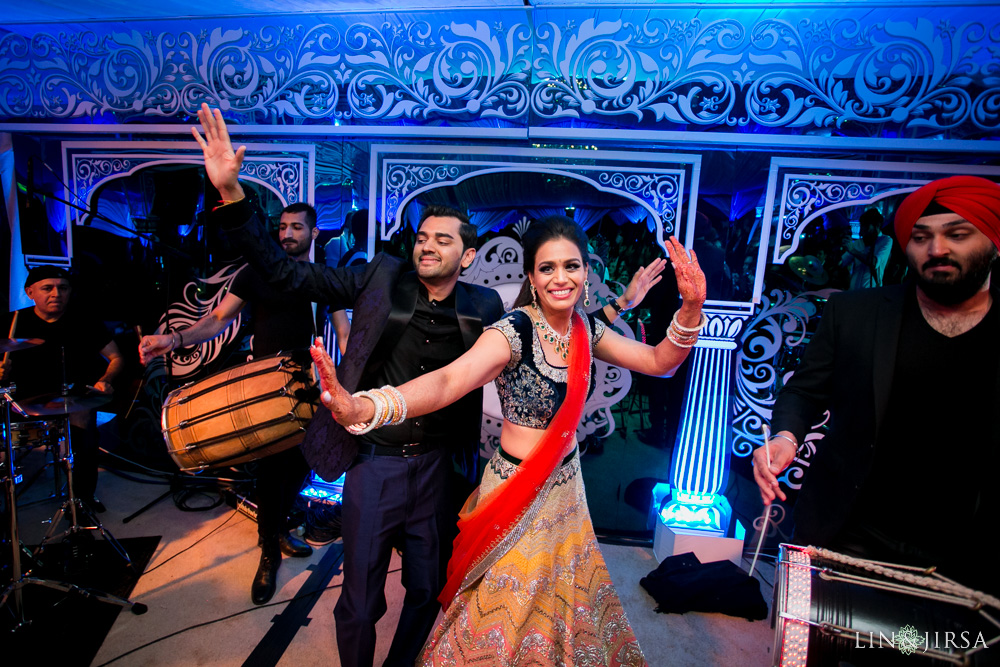 Bride and groom during their Sangeet ceremony at Terranea Resort Indian wedding photographed by Lin and Jirsa