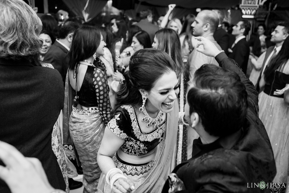 Guests dancing together during Sangeet ceremony at Indian wedding photographed by Lin and Jirsa