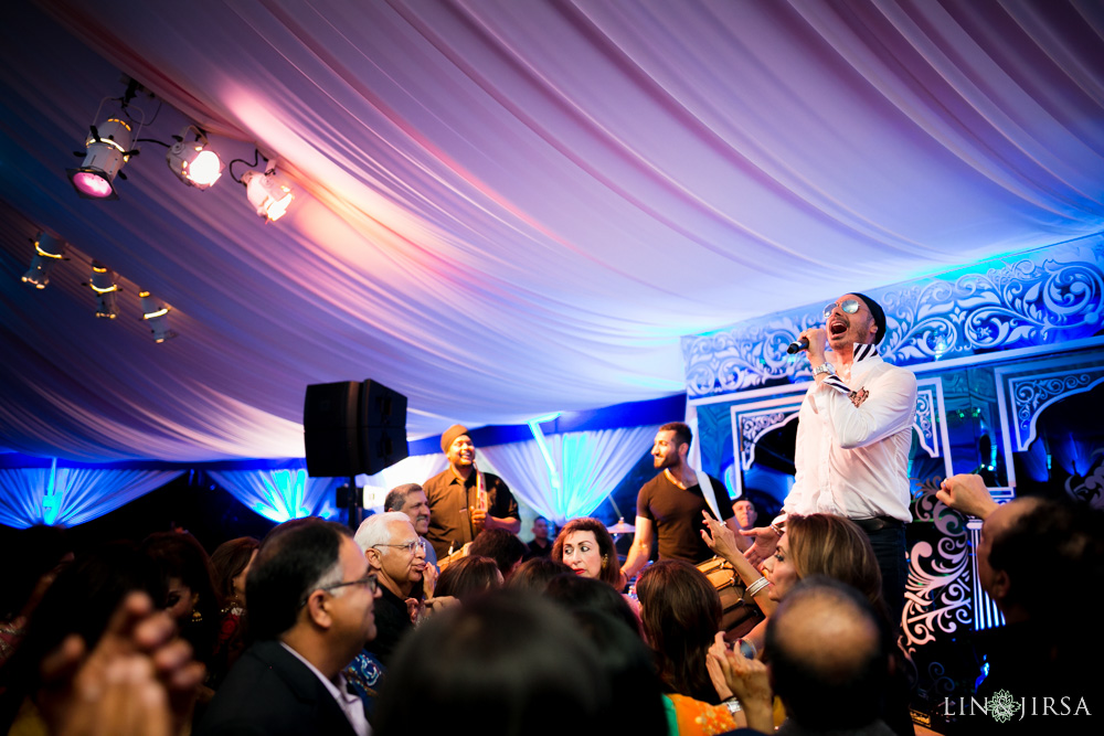 Live musical performance during Sangeet ceremony at Indian wedding photographed by Lin and Jirsa
